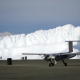 Windracers ULTRA UAV in front of ice cliffs at Rothera Research Station (Windracers & British Antarctic Survey)