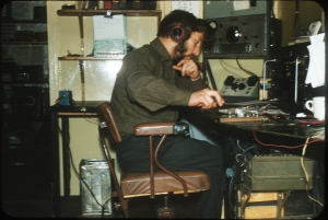 Roy at the Radio Office Mawson, April 1957
