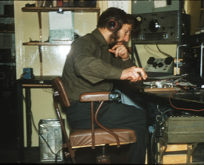 Roy at the Radio Office Mawson, April 1957